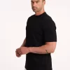 model in a black Adamsson t-shirt, round neck