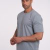 model in a grey Adamsson t-shirt, round neck